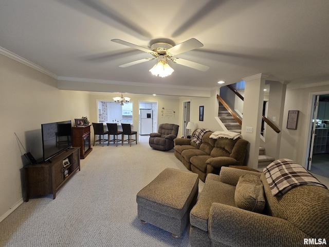2704 Kings Pointe NE Unit 2704, Quincy, IL 62305 - living room featuring ceiling fan with notable chandelier, baseboards, light carpet, ornamental molding, and stairs