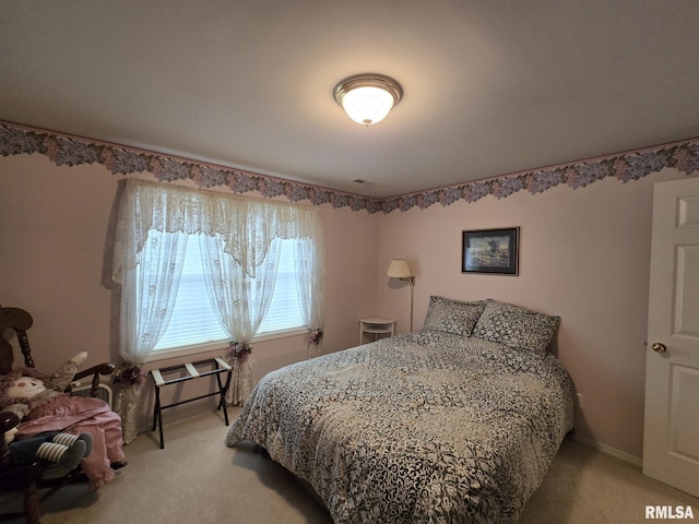2704 Kings Pointe NE Unit 2704, Quincy, IL 62305 - bedroom with light carpet