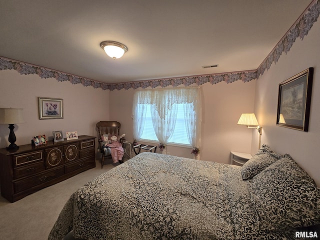 2704 Kings Pointe NE Unit 2704, Quincy, IL 62305 - carpeted bedroom featuring visible vents