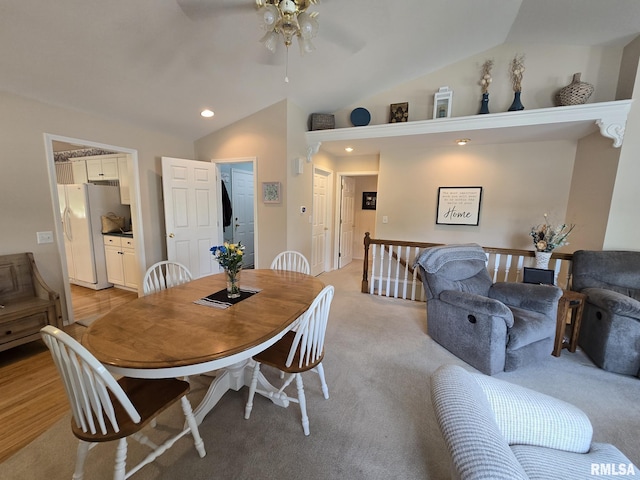 2704 Kings Pointe NE Unit 2704, Quincy, IL 62305 - dining space with lofted ceiling, a ceiling fan, recessed lighting, and light colored carpet