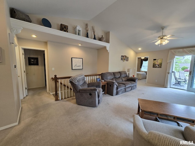 2704 Kings Pointe NE Unit 2704, Quincy, IL 62305 - living room featuring vaulted ceiling, light carpet, baseboards, and a ceiling fan