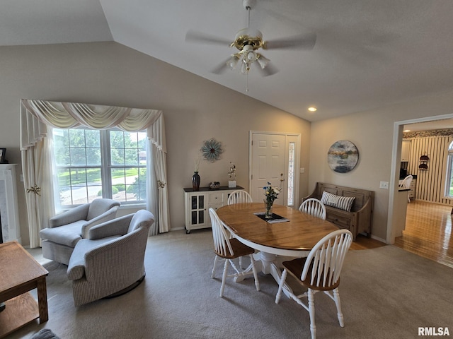 2704 Kings Pointe NE Unit 2704, Quincy, IL 62305 - dining space featuring lofted ceiling, ceiling fan, and light carpet