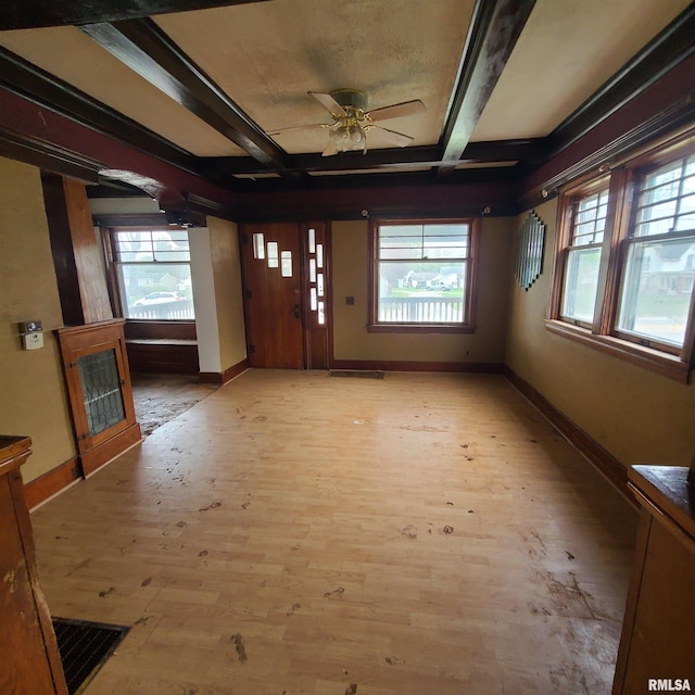 207 W Main St, Knoxville, IL 61448 - foyer entrance with light wood-type flooring, baseboards, and ceiling fan