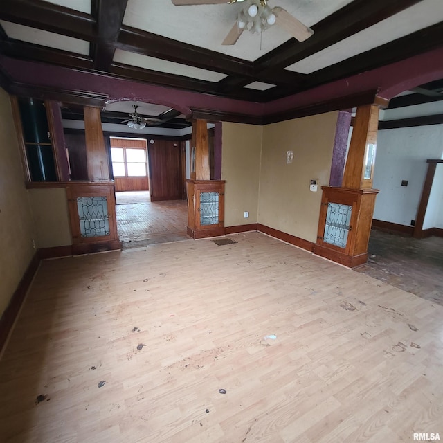 207 W Main St, Knoxville, IL 61448 - unfurnished living room with baseboards, ceiling fan, coffered ceiling, and wood finished floors