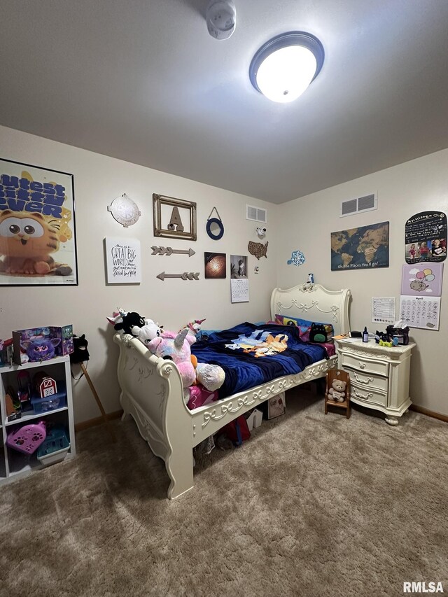 carpeted bedroom featuring baseboards and visible vents