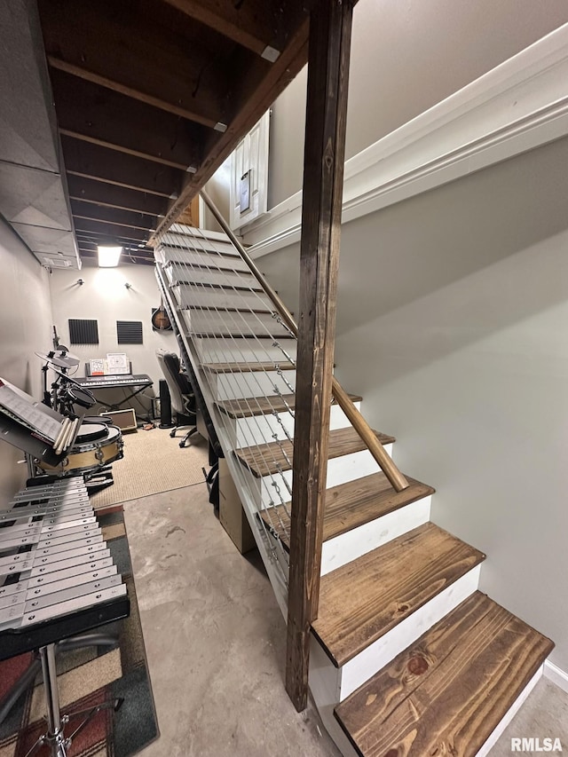stairs with concrete floors