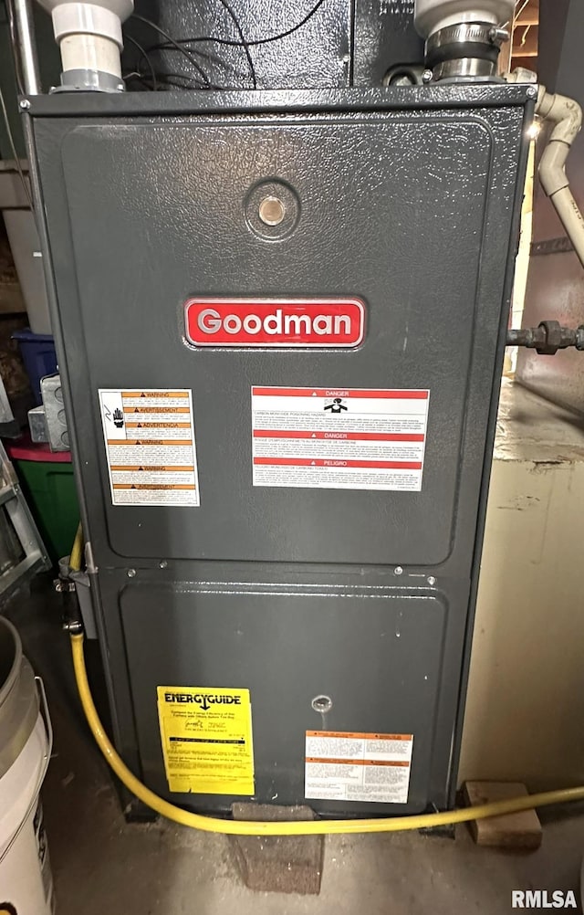 utility room with heating unit