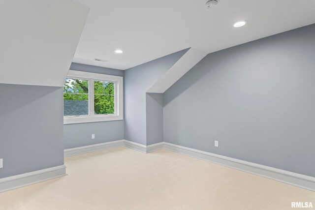 additional living space featuring baseboards, carpet flooring, visible vents, and recessed lighting