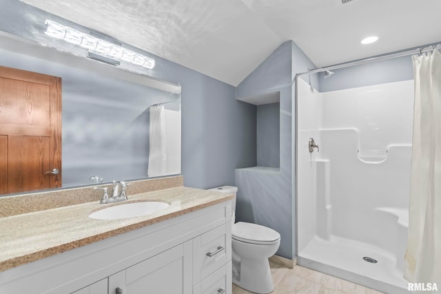 bathroom with lofted ceiling, toilet, marble finish floor, a shower stall, and vanity