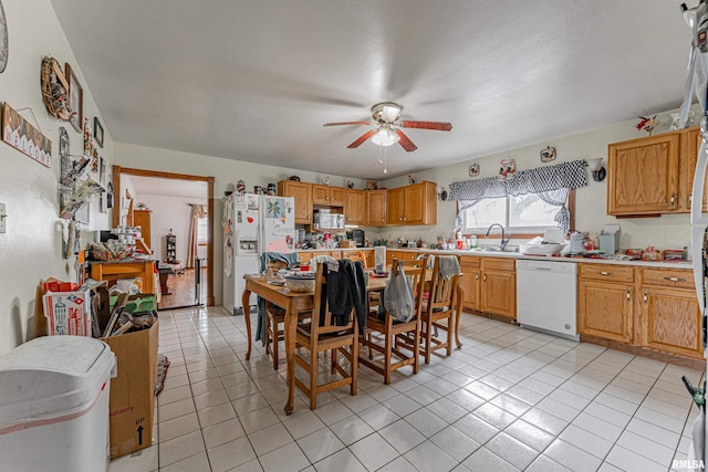 dining room featuring light tile patterned flooring and ceiling fan