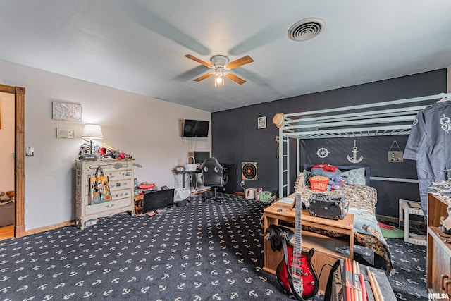 carpeted bedroom with ceiling fan, baseboards, and visible vents
