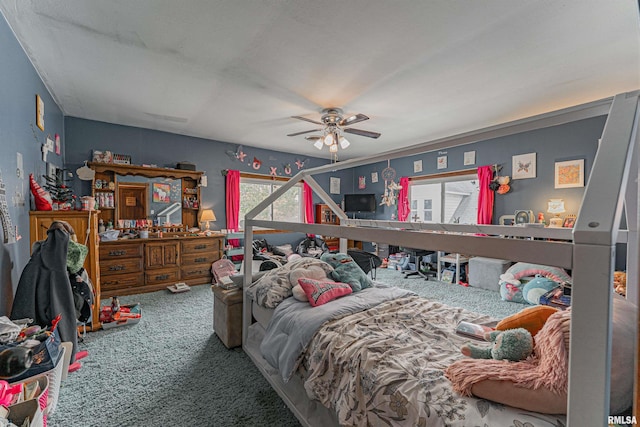 carpeted bedroom featuring a ceiling fan