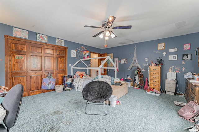 interior space with a ceiling fan and carpet floors