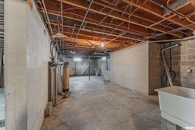 unfinished below grade area with a sink