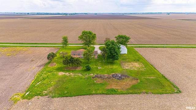 birds eye view of property with a rural view