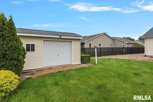 garage with fence