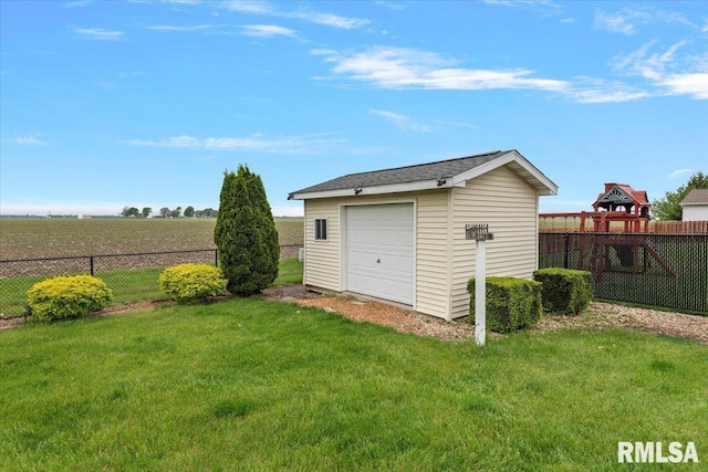 view of outbuilding with an outdoor structure and fence