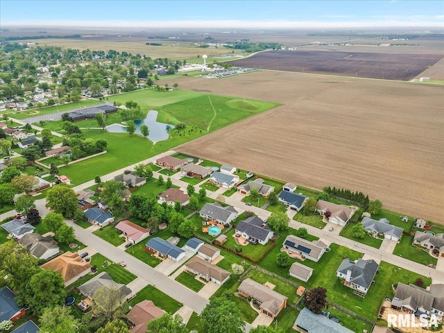 aerial view with a water view and a residential view