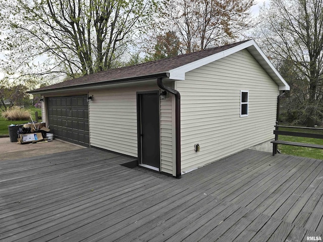 deck with a detached garage