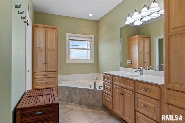 full bath featuring tile patterned floors, vanity, and a bath