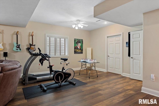 workout room featuring a ceiling fan, recessed lighting, baseboards, visible vents, and wood finished floors