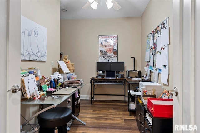 office featuring dark wood-type flooring and a ceiling fan