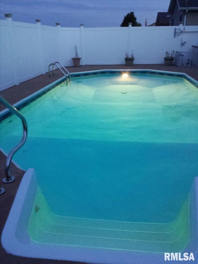 view of pool featuring a fenced in pool and a fenced backyard