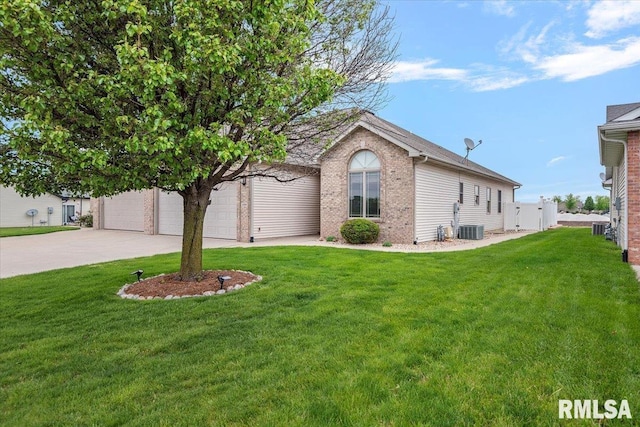 view of front of property featuring concrete driveway, brick siding, an attached garage, and a front lawn