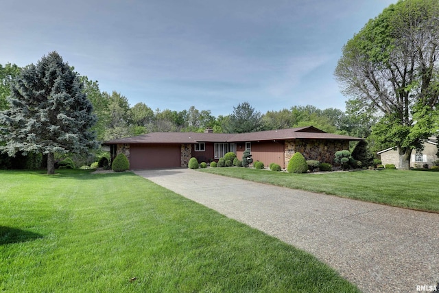 432 W Fairway Dr, Quincy, IL 62305 - ranch-style house featuring stone siding, a garage, a front lawn, and driveway