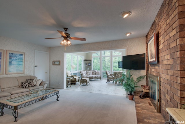432 W Fairway Dr, Quincy, IL 62305 - living area with a ceiling fan and a fireplace