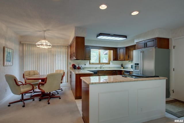 432 W Fairway Dr, Quincy, IL 62305 - kitchen featuring a chandelier, a sink, recessed lighting, pendant lighting, and stainless steel refrigerator with ice dispenser