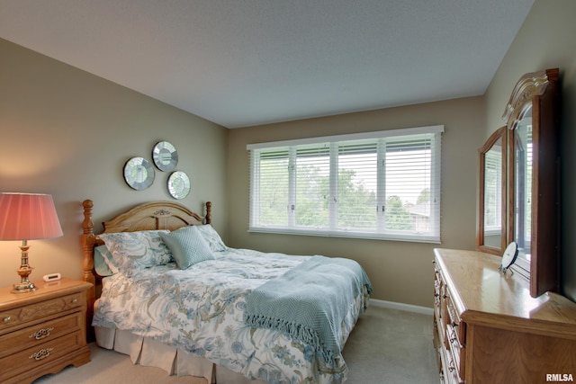 432 W Fairway Dr, Quincy, IL 62305 - bedroom featuring light carpet and baseboards