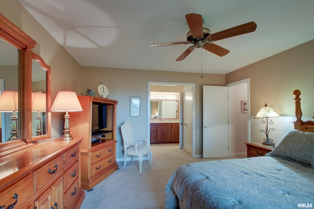 432 W Fairway Dr, Quincy, IL 62305 - bedroom featuring light carpet, baseboards, connected bathroom, and a ceiling fan