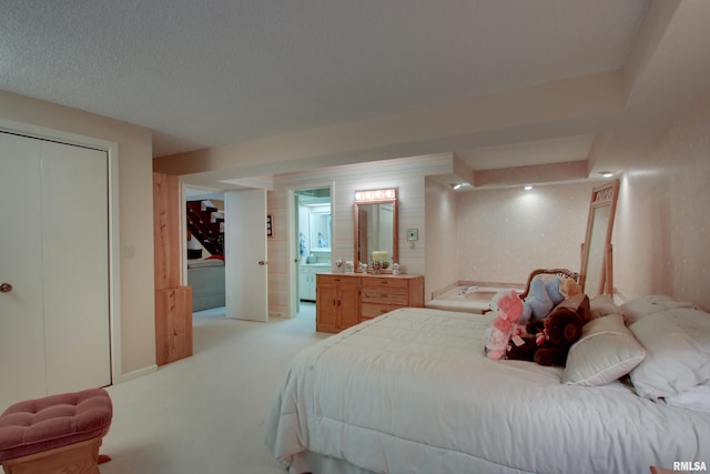 432 W Fairway Dr, Quincy, IL 62305 - bedroom featuring light colored carpet and ensuite bathroom