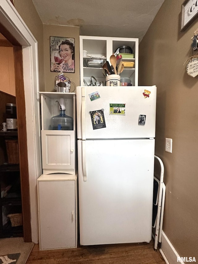 277 N Ivan Ave, Galesburg, IL 61401 - kitchen view of freestanding refrigerator and wood finished floors