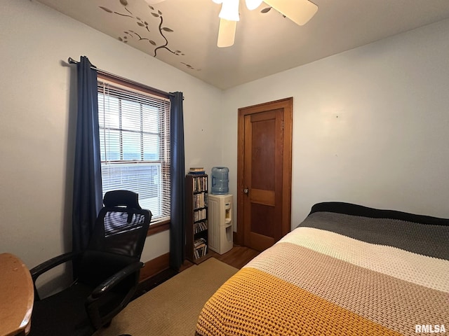 277 N Ivan Ave, Galesburg, IL 61401 - bedroom with wood finished floors, a ceiling fan, and an office area