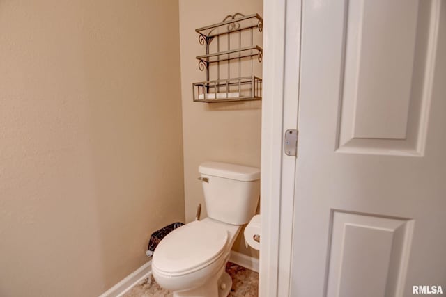 2628 S Forrest Green Dr, Decatur, IL 62521 - bathroom with toilet and baseboards
