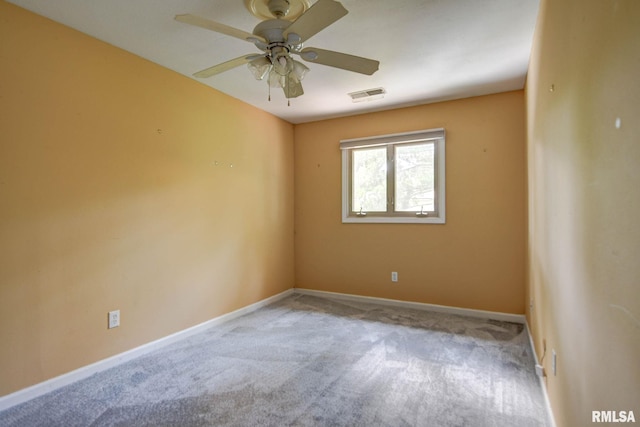 2628 S Forrest Green Dr, Decatur, IL 62521 - spare room with carpet floors and a ceiling fan