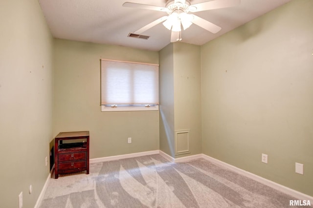 2628 S Forrest Green Dr, Decatur, IL 62521 - unfurnished room with a ceiling fan and carpet