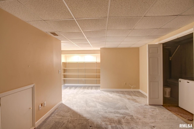 2628 S Forrest Green Dr, Decatur, IL 62521 - below grade area featuring a drop ceiling and carpet flooring