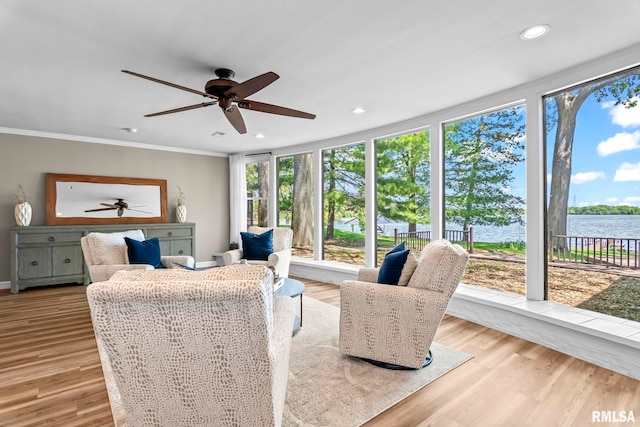 188 E Hazel Dell Ln, Springfield, IL 62712 - living area with a ceiling fan, ornamental molding, recessed lighting, a water view, and baseboards