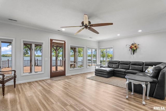 188 E Hazel Dell Ln, Springfield, IL 62712 - living area featuring ceiling fan, a water view, light wood-style floors, recessed lighting, and crown molding