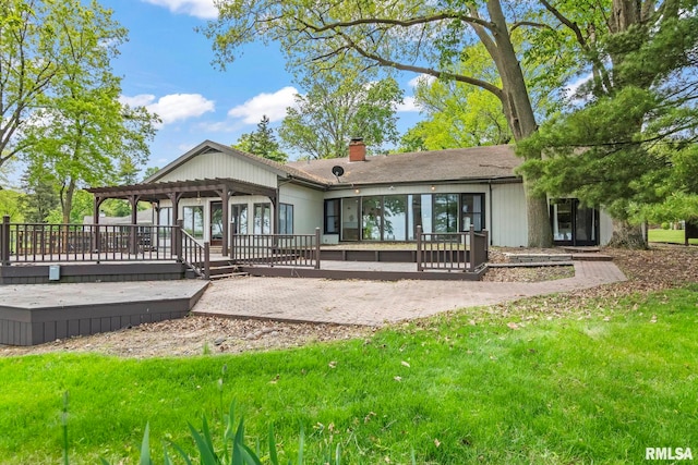 188 E Hazel Dell Ln, Springfield, IL 62712 - back of property with a deck, a chimney, a patio area, and a pergola