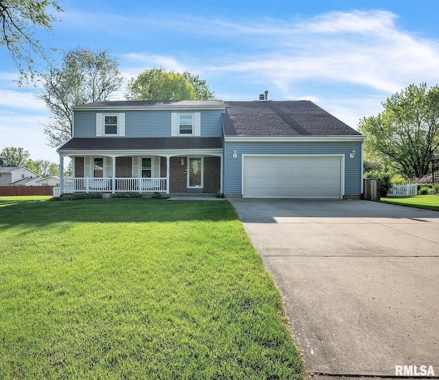 522 Edwards Ave, Galesburg, IL 61401 - traditional-style house with a porch, driveway, an attached garage, and roof with shingles