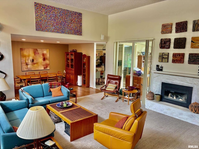 2201 W Washington St Unit 19, Springfield, IL 62702 - living room with a premium fireplace and a textured ceiling