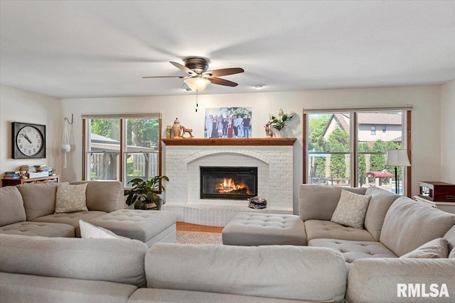 1405 Woods Farm Ln, Springfield, IL 62704 - living area featuring a ceiling fan and a brick fireplace