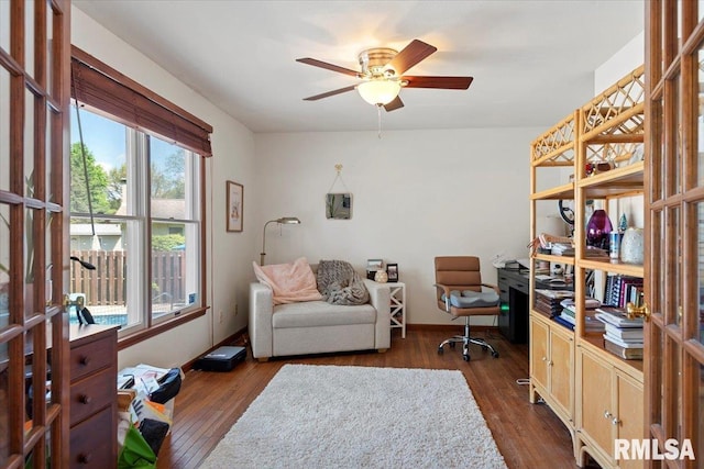 1405 Woods Farm Ln, Springfield, IL 62704 - home office featuring plenty of natural light, a ceiling fan, dark wood finished floors, and baseboards