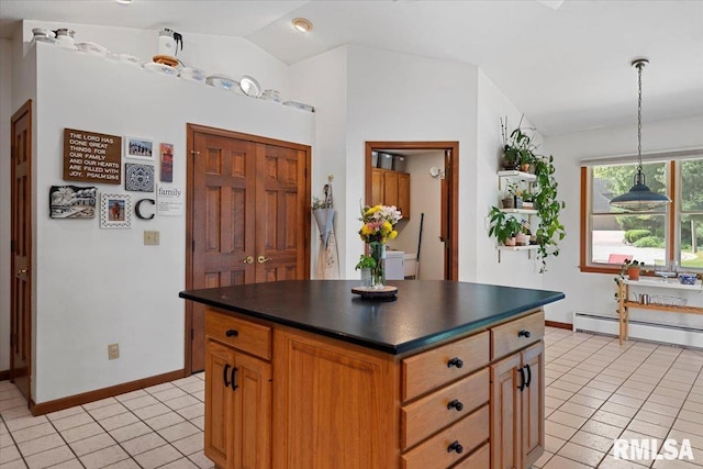 1405 Woods Farm Ln, Springfield, IL 62704 - kitchen with dark countertops, lofted ceiling, baseboard heating, light tile patterned floors, and baseboards