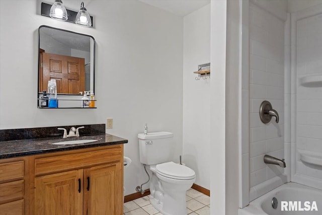 1405 Woods Farm Ln, Springfield, IL 62704 - full bath with vanity, toilet, tile patterned floors, bathing tub / shower combination, and baseboards