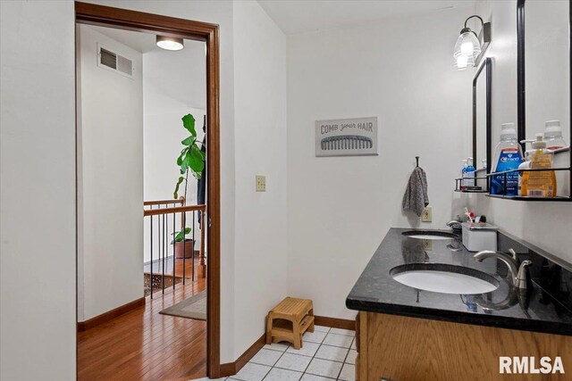 1405 Woods Farm Ln, Springfield, IL 62704 - bathroom with double vanity, baseboards, and tile patterned flooring